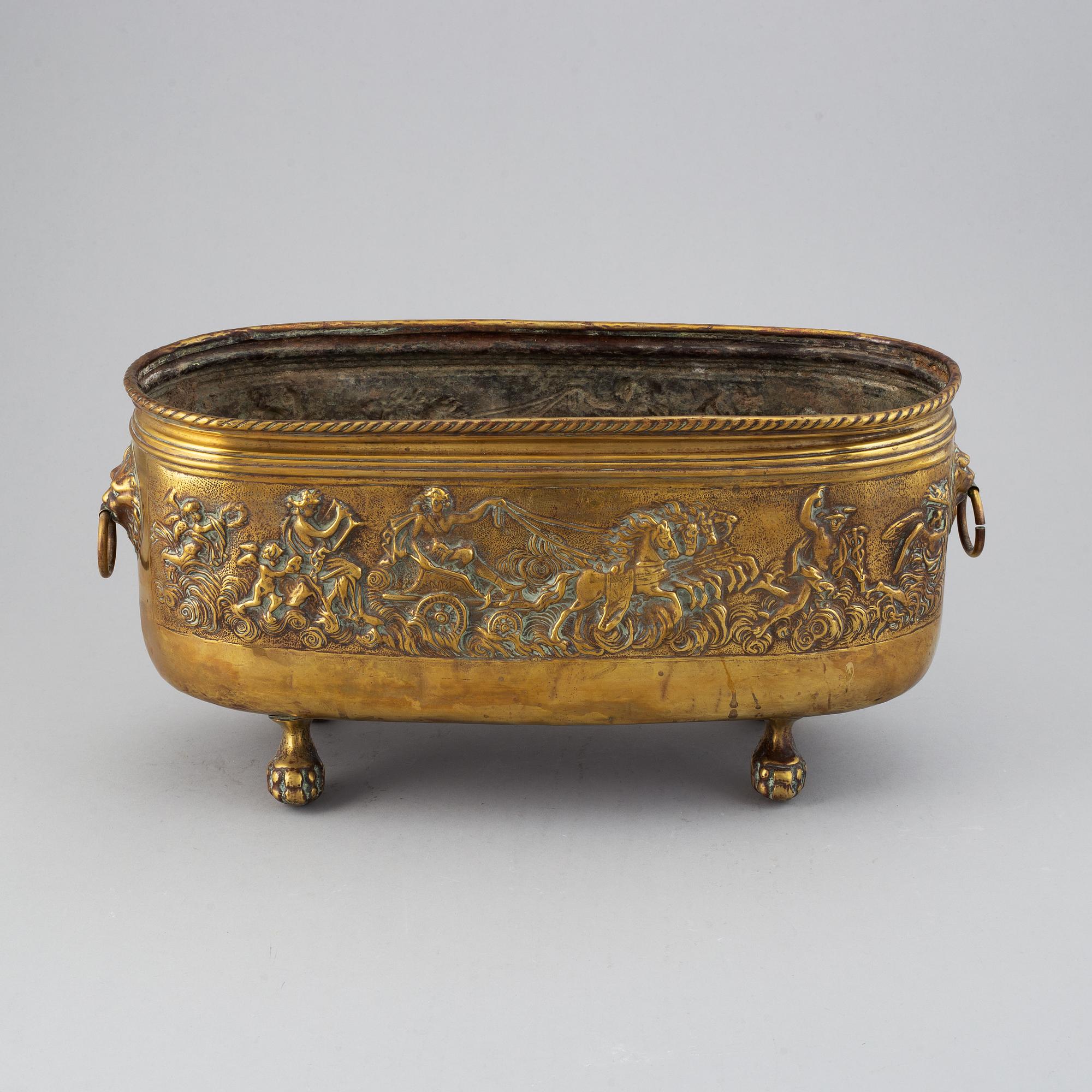 A 19th century brass jardiniere.