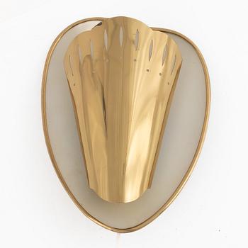 A Swedish Modern brass wall sconce, 1950's.