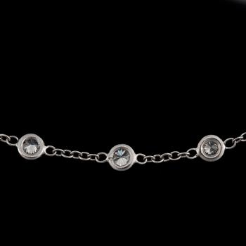 65. A brilliant-cut diamond longchain necklace. 82 diamonds, total carat weight circa 8.96 cts.