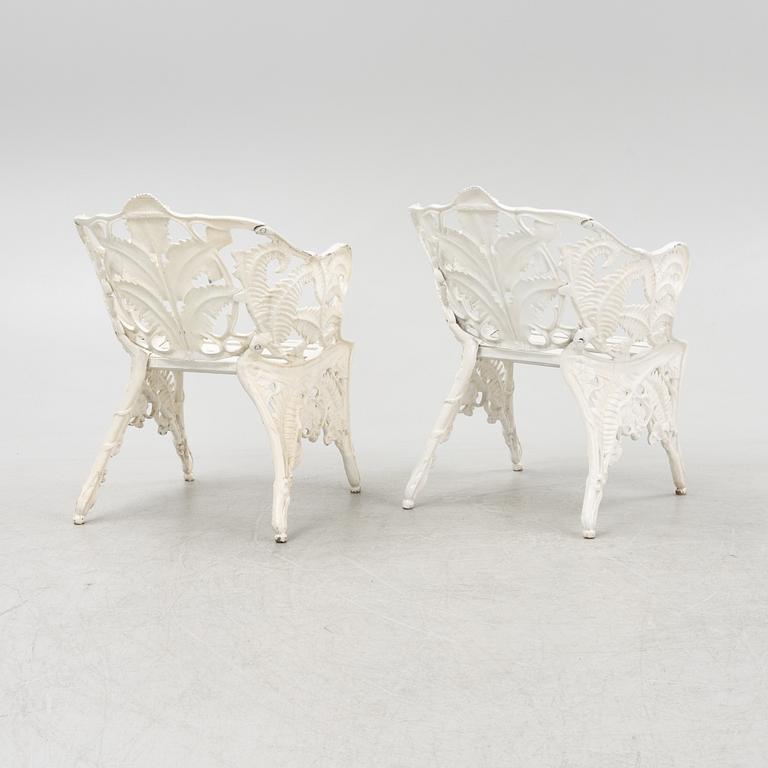 A pair of painted aluminum armchairs, second part of the 20th Century.