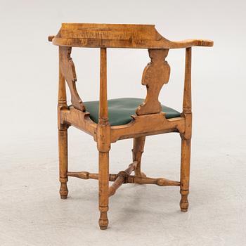 A rococo birch armchair, 18th Century.