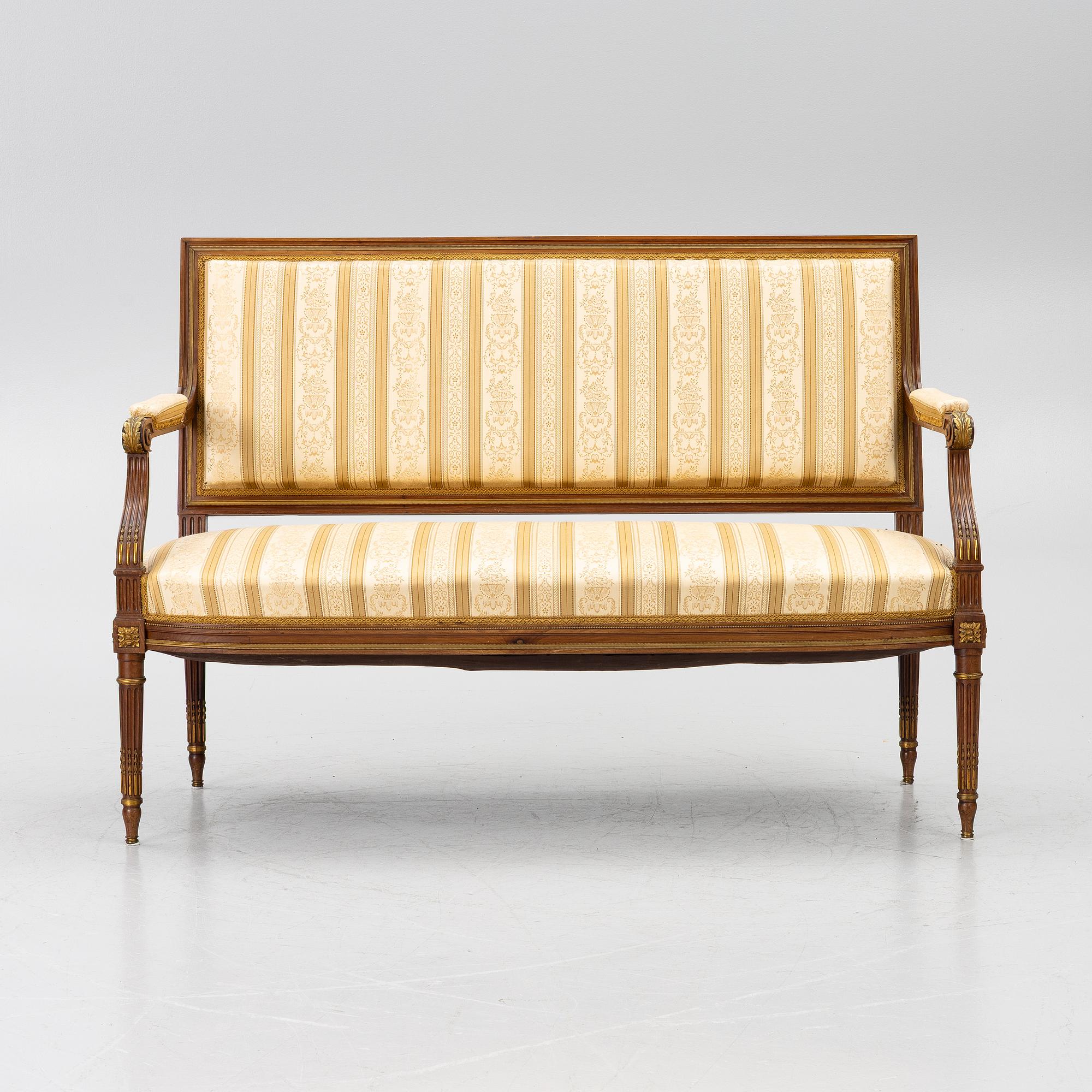 A seven-piece seating group, Louis XVI style, early 20th Century.
