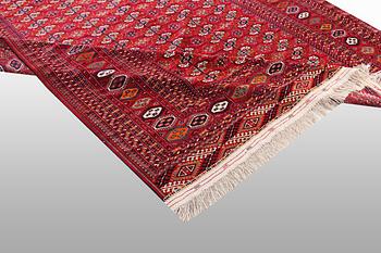 A carpet, semi-antique Tekke, ca 330 x 250 cm.