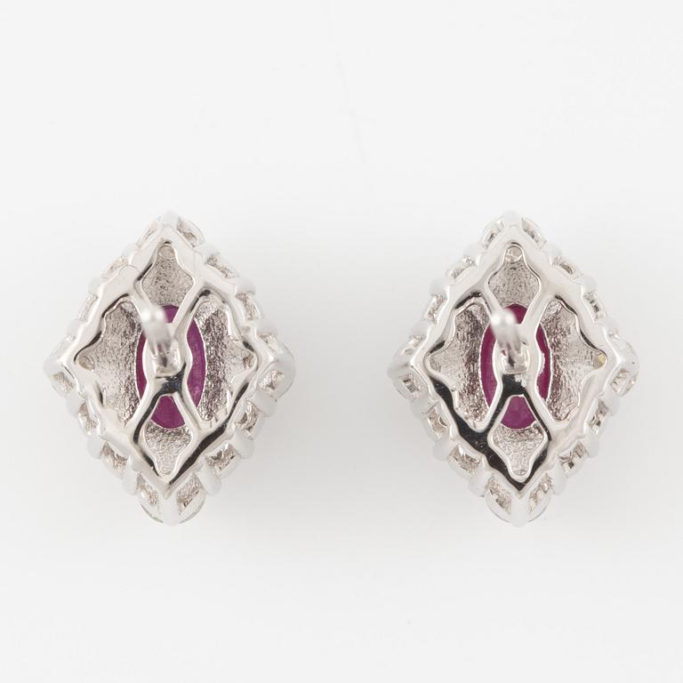 Earrings 18K white gold with rubies and brilliant-cut diamonds.