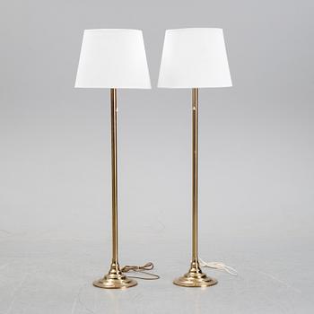 Bergboms, a pair of model 'G-024' brass floor lamps. Second half of the 20th century.