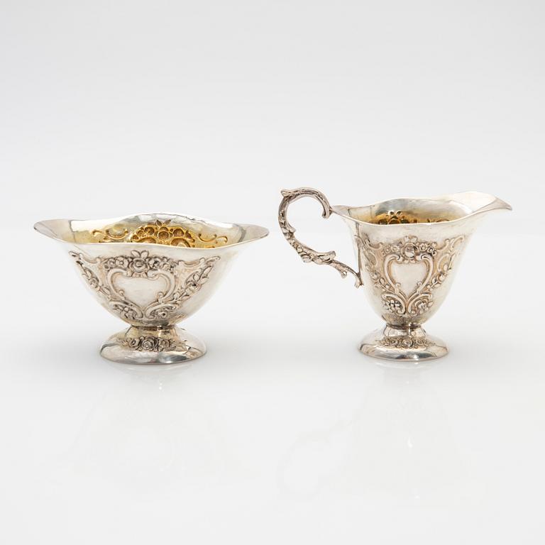 Cream jug and sugar bowl, silver, early 20th century.