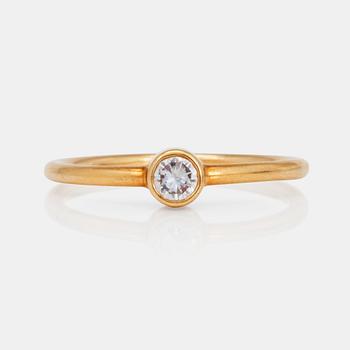 RING, signerad Cartier, med briljantslipad diamant ca 0.15ct.