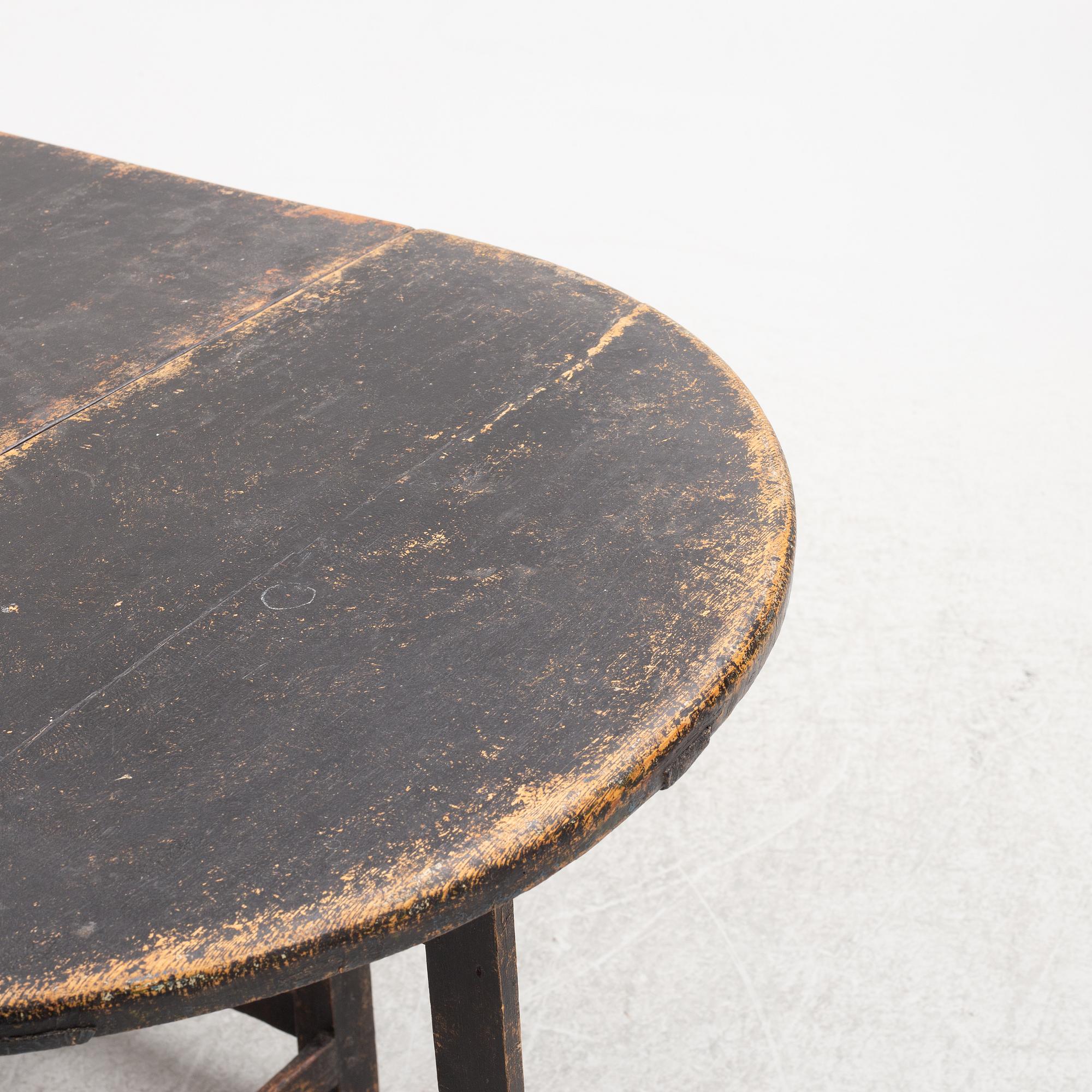 A Swedish wooden table, 19th century.