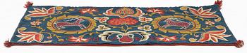 An embroidered Carriage cushion, c 102 x 48 cm Wemmenhög district, southern Skåne, first quarter of the 19th century.