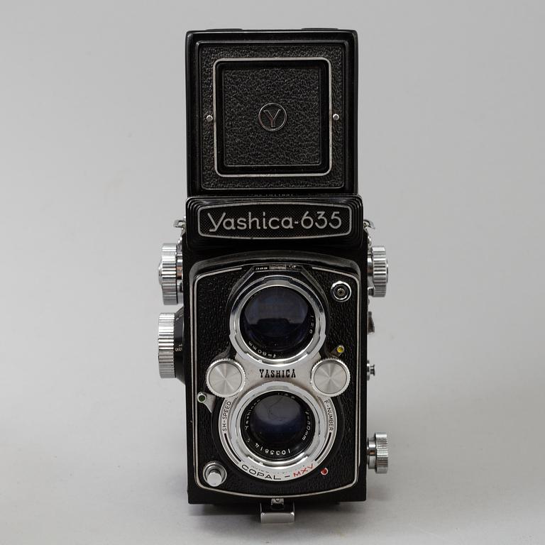 Two Twin Lens Reflex Cameras, a 1950s /60s Yashica 635 and a 1930s Rolleicord.