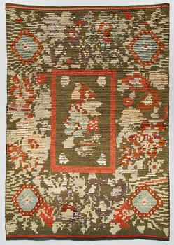 A Finnish folkart long pile ryijy-rug, turn of the 19th/20th Century. Circa 190 x 135 cm.