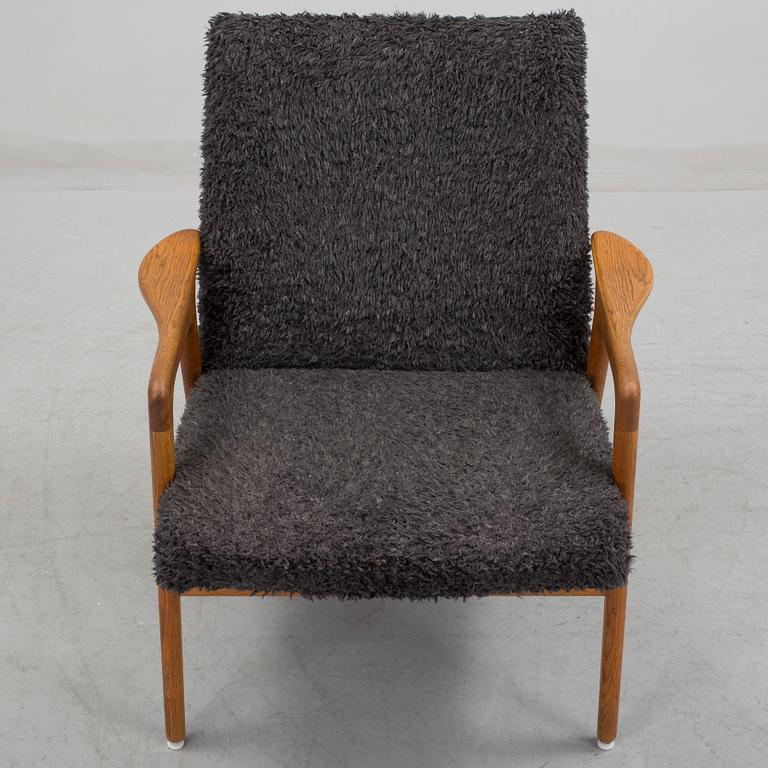 YNGVE EKSTRÖM, a 'Mingo' oak armchair, designed in 1956.