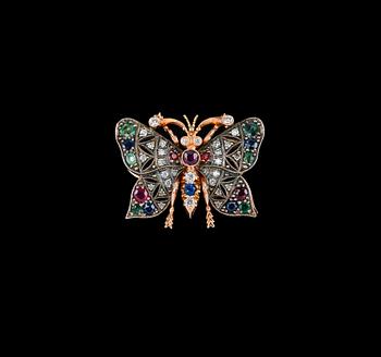 A BROOCH, sapphires, rubies, emeralds, brilliant cut diamonds c. 0.5 ct. 14K gold, weight 8 g.