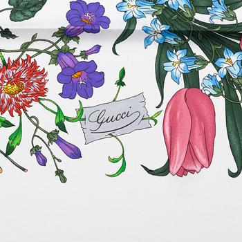 Gucci, a 'Flora' twill silk scarf.