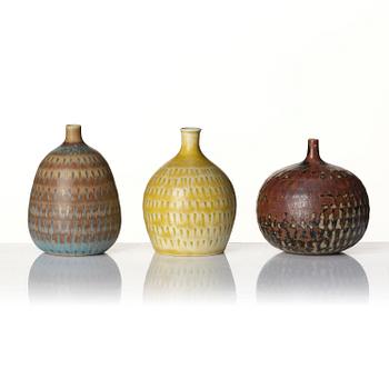 Stig Lindberg, a set of 7 stoneware miniature vases and 5 bowls, Gustavsberg Studio, Sweden, 1955-68.