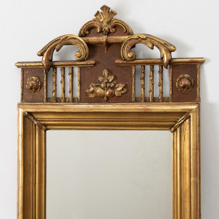 A mirror, Empire, 19th century.