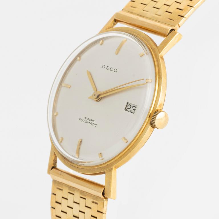 Deco, 18k wristwatch with bracelet in 18K gold, 34 mm.