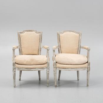 A pair of Louis XVI-style armchairs, late 20th century.