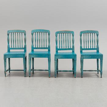 A set of four 19th century folk art chairs.