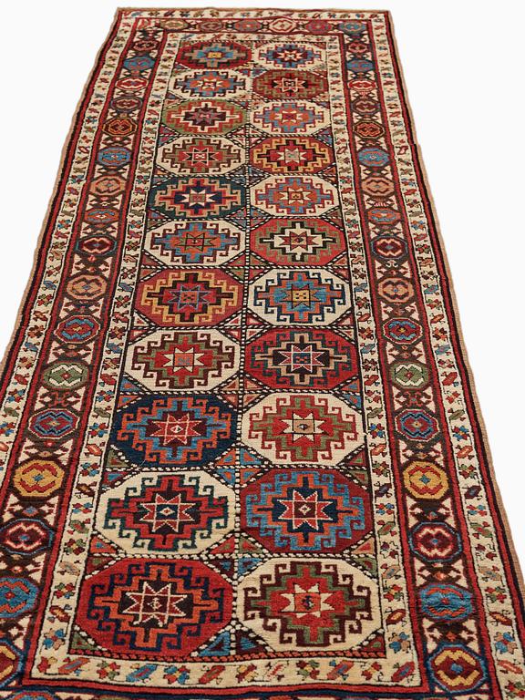 An antique Moghan 'Long rug', Kazak region South Caucasus, ca 360 x 106,5 cm.