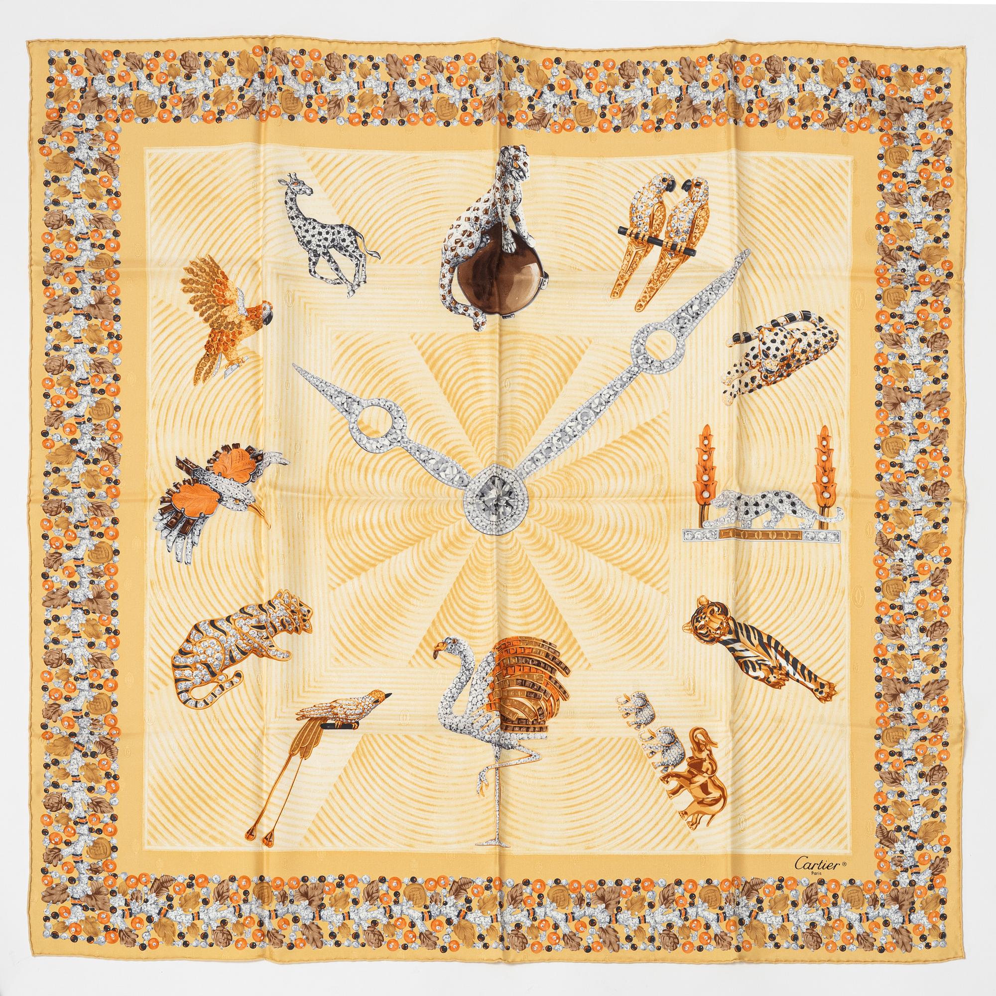 Cartier, a jaquard silk scarf.