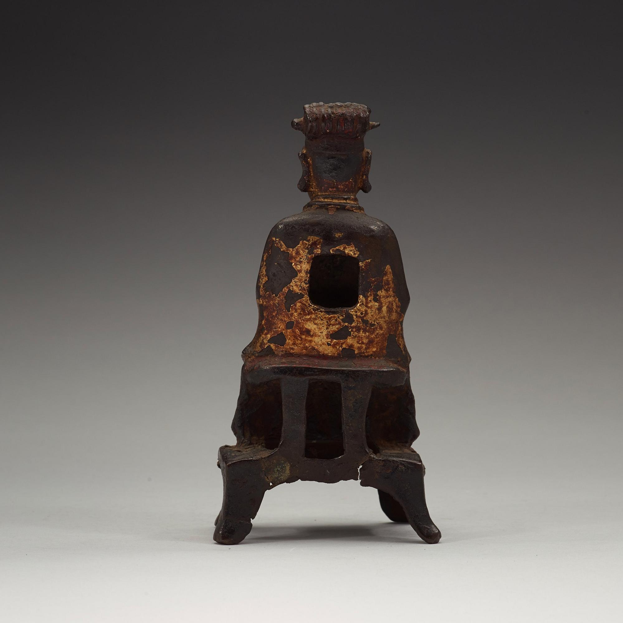 A bronze figure of a daoist deity, Ming dynasty (1368-1644).