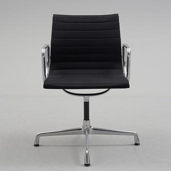 A 'EA 104 Swivel' armchair by Charles & Ray Eames, Vitra, 2016.