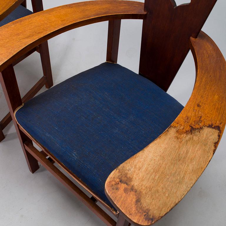 A pair of Arts and Crafts armchairs, early 20th century.