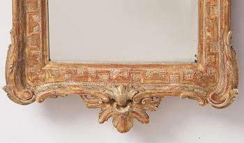 A Gustavian carved giltwood mirror, 1770's.