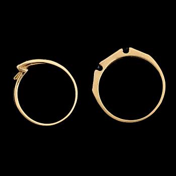 RINGAR, 2 st, 18 k guld, briljantslipde diamanter. Total vikt 4 g.