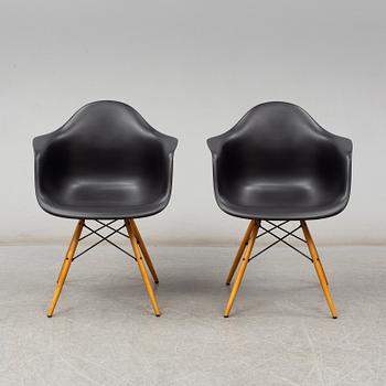 CHARLES & RAY EAMES, a pair of 'DAW' armchairs, Vitra, 2017.