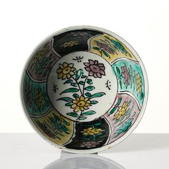 A famille noire cup with stand, Qing dynasty, Kangxi (1662-1722).