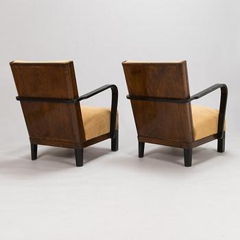 A pair of 1930s 'Panu' armchairs model 234, Asko Finland.