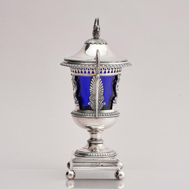 Lockurna, silver med blå glasinsats, Frankrike 1800-talets början.