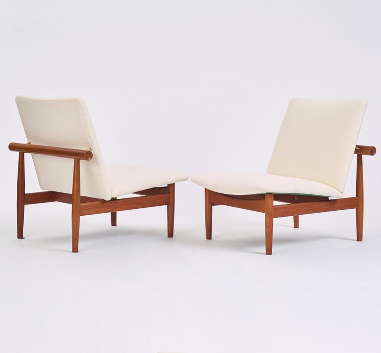 Finn Juhl, a pair of 'Japan' (FD-137) easy chairs and an ottoman, France & Son, Denmark, 1960s.