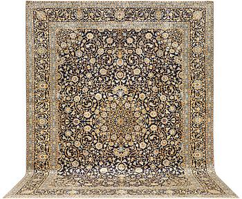 A Kashan carpet, a. 420 x 309 cm.