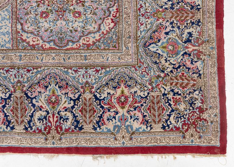 A Kerman carpet, c. 388 x 299 cm.