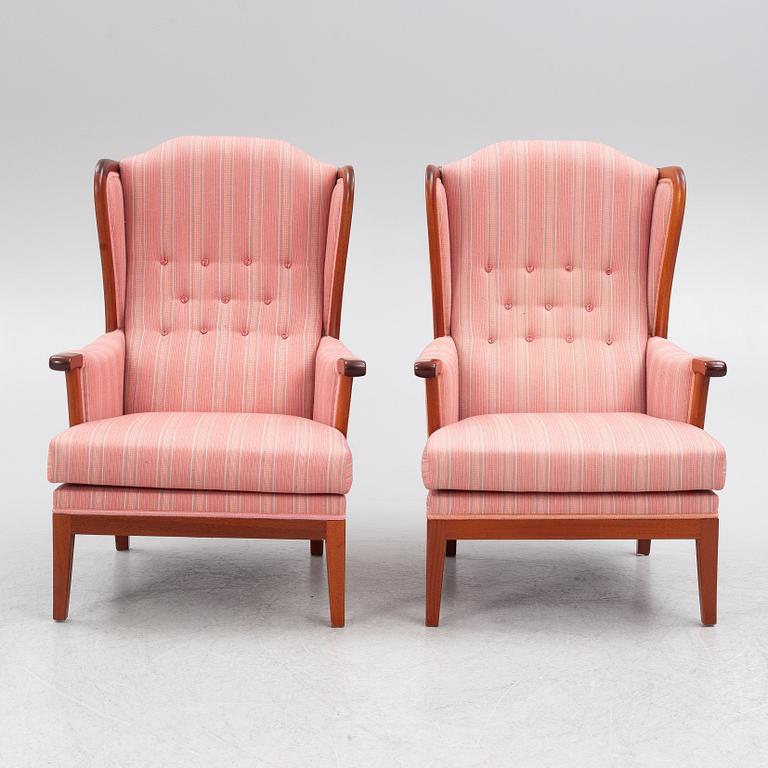 Carl Malmsten, a pair of 'Husfadern' armchairs, OH Sjögren 1988.