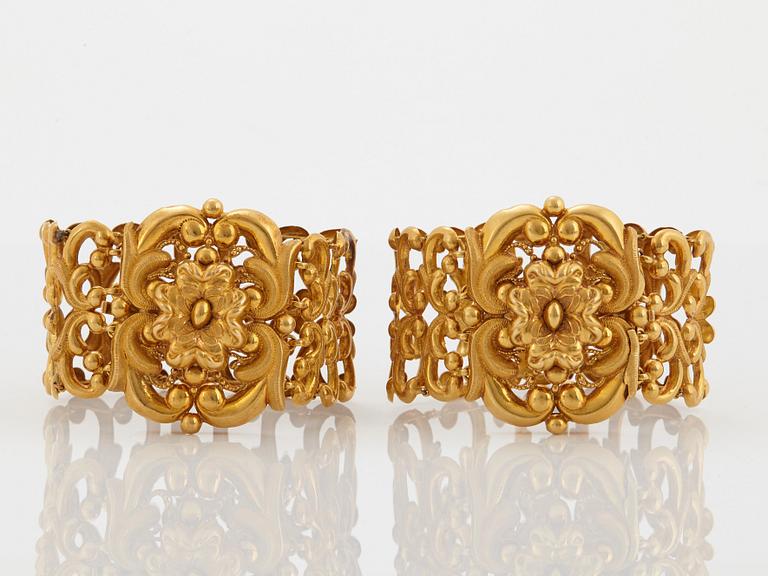 A pair of 19th century 18K gold bracelets.