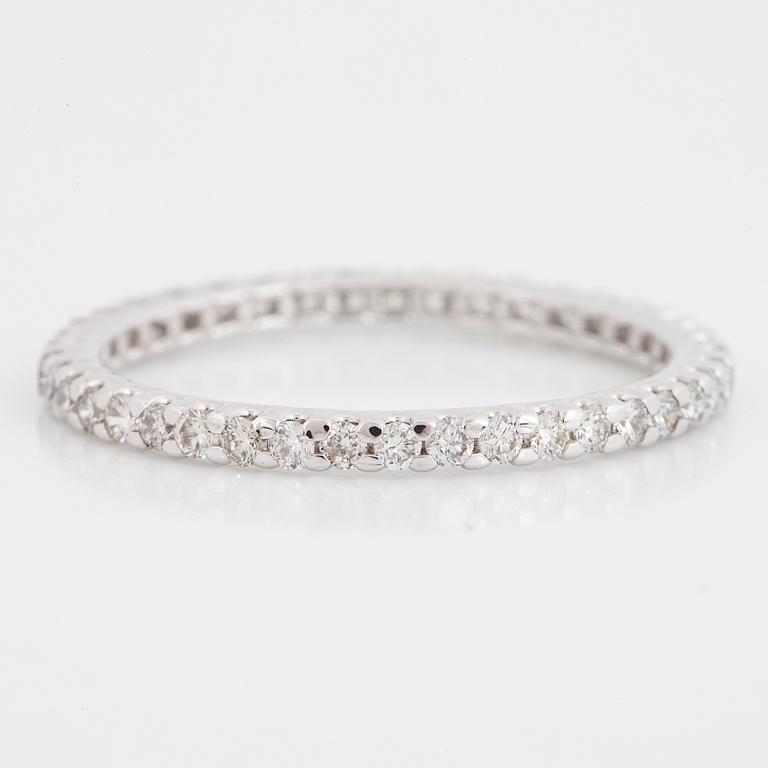 ALLIANSRING, tunn, 18K vitguld med runda briljantslipade diamanter.