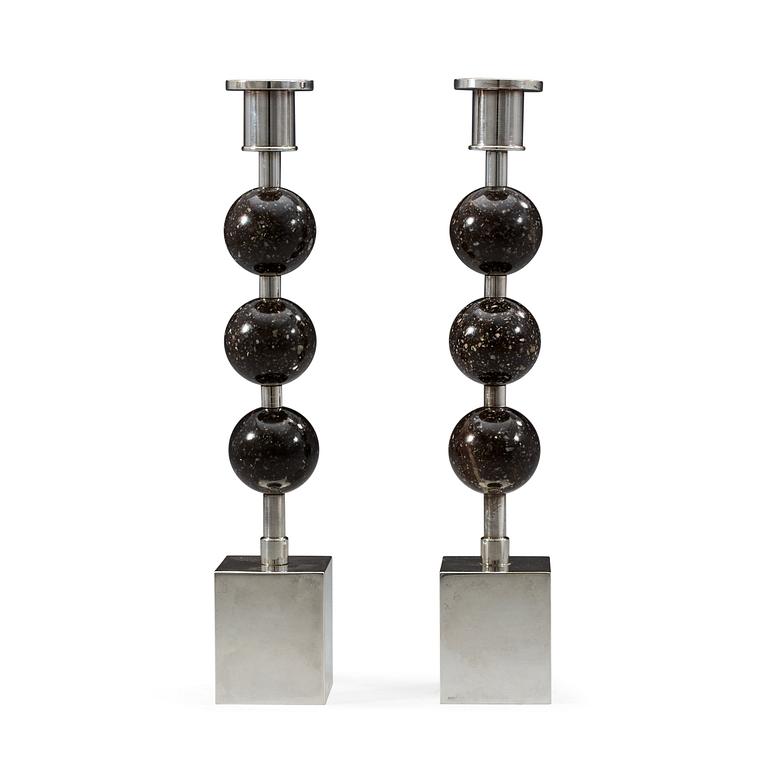 Sigurd Persson, a pair of silver plated and porphyry candlesticks, Sweden.