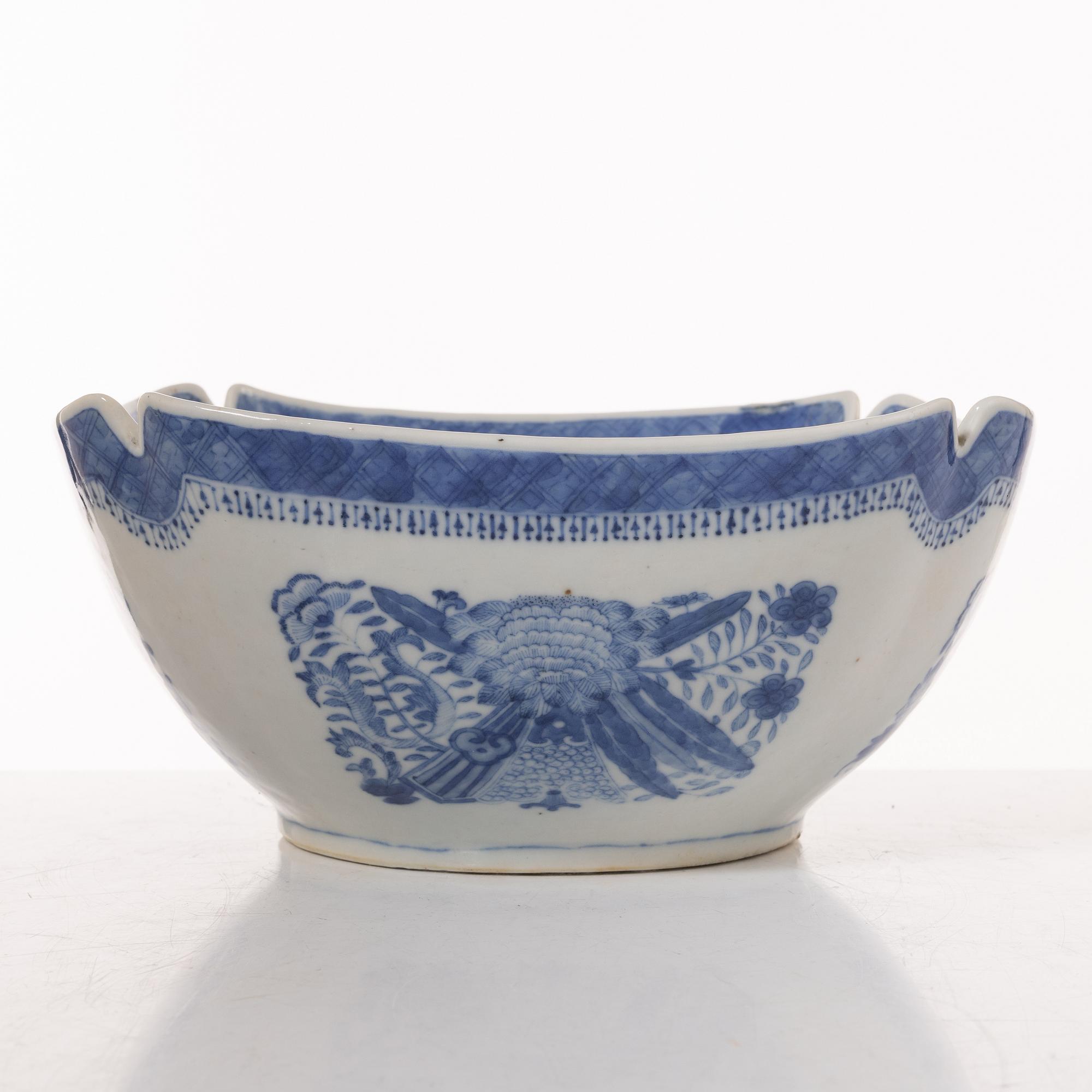 A group  of three serving dishes, a serving bowl, a cup, and seven plates, porcelain, including China 18th century.