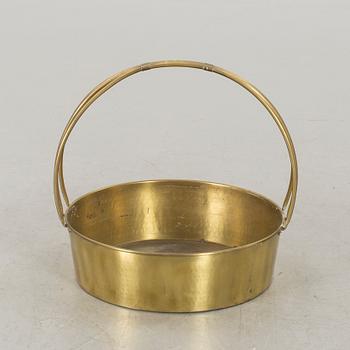 A BRASS BASKET.