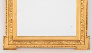 A mirror and console table from around the year 1900.