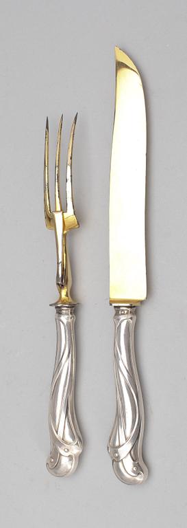 UPPLÄGGNINGSBESTICK, 2 st, silver, jugend, sannolikt Frankrike, 1900-tal.