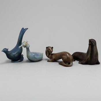 GUNNAR NYLUND, four stoneware figurines, from Rörstrand.