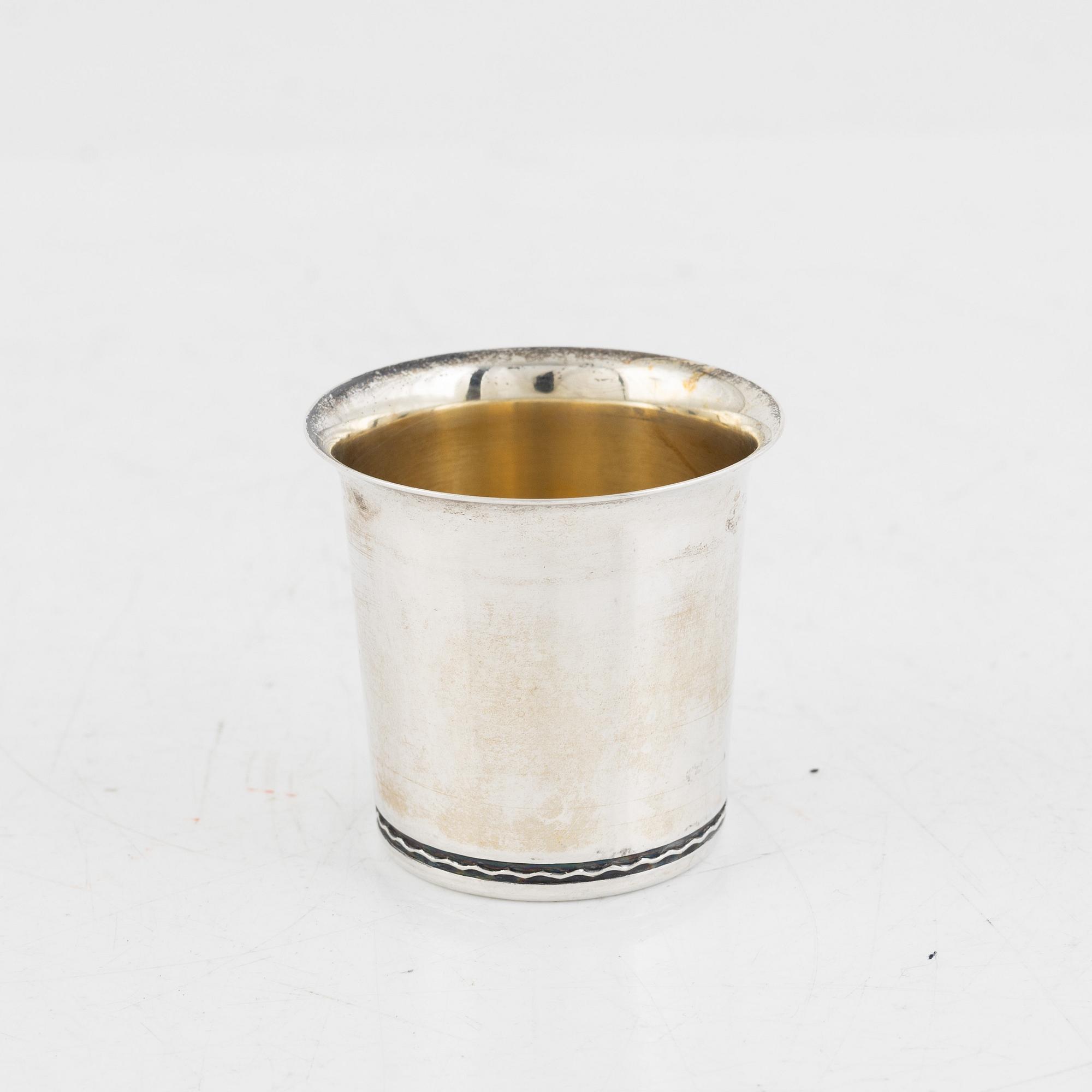 A set of twenty Swedish silver cups, including Tore Eldh, Ceson, Gothenburg 1981.