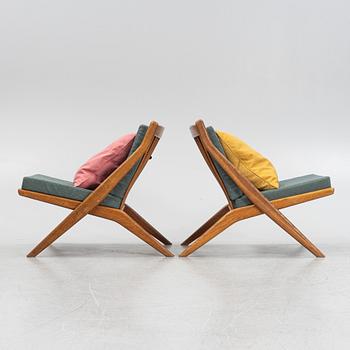 Folke Ohlsson, a pair of oak Frisco easy chairs, Nodafors, 1960s.