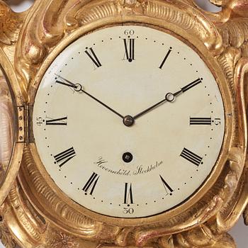 A Swedish Rococo 18th Century wall clock by J. Hovenschiöld.