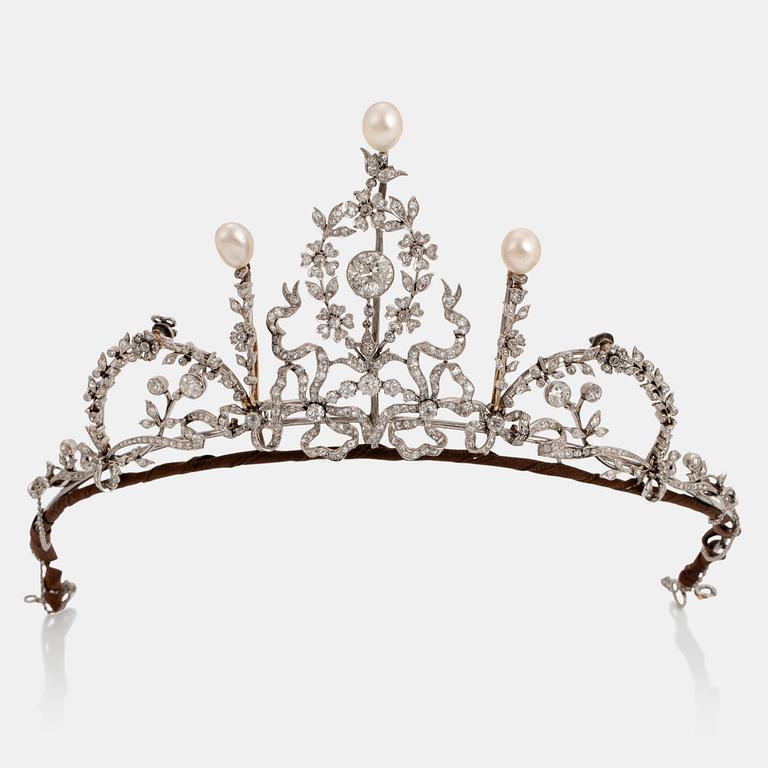 A platinum tiara/necklace combination set with old-cut diamonds and pearls.